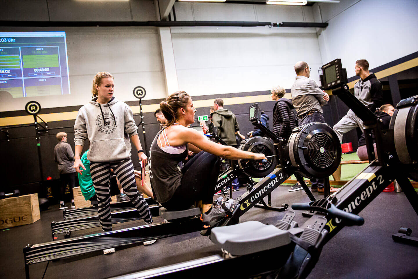 Rowing discipline and a visible scoreboard.